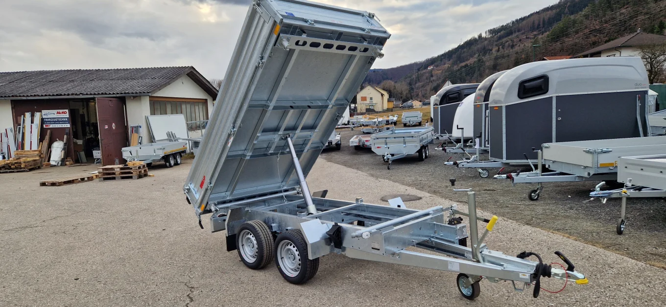 PKW-Anhänger, Dreiseitenkipper, Humbaur HTK 2700.27 mit Stahlbordwänden und Handpumpe oder wahlweise E-Kombipumpe, 2700 kg GG